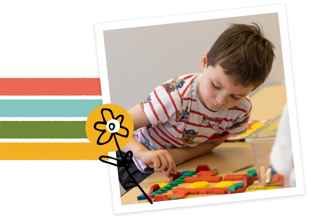 pre-k child playing with blocks